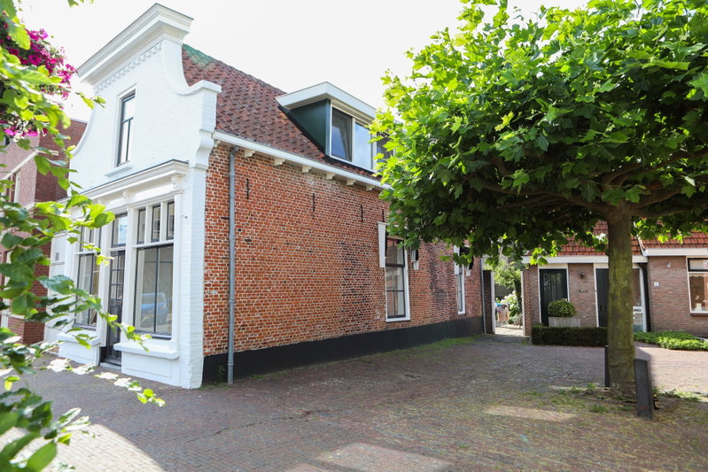 Zij aanzicht van het gebouw - Buitenkant van het appartement